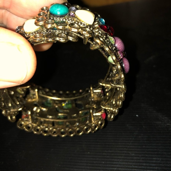 Colorful boho style rhinestones and colourful stones embedded in a gold metal. - Picture 10 of 12